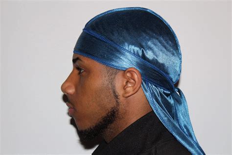 blue silky durag brush.